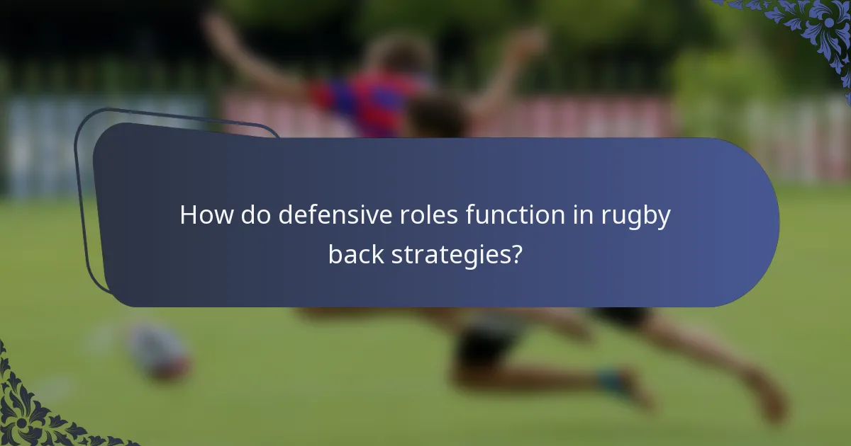 How do defensive roles function in rugby back strategies?